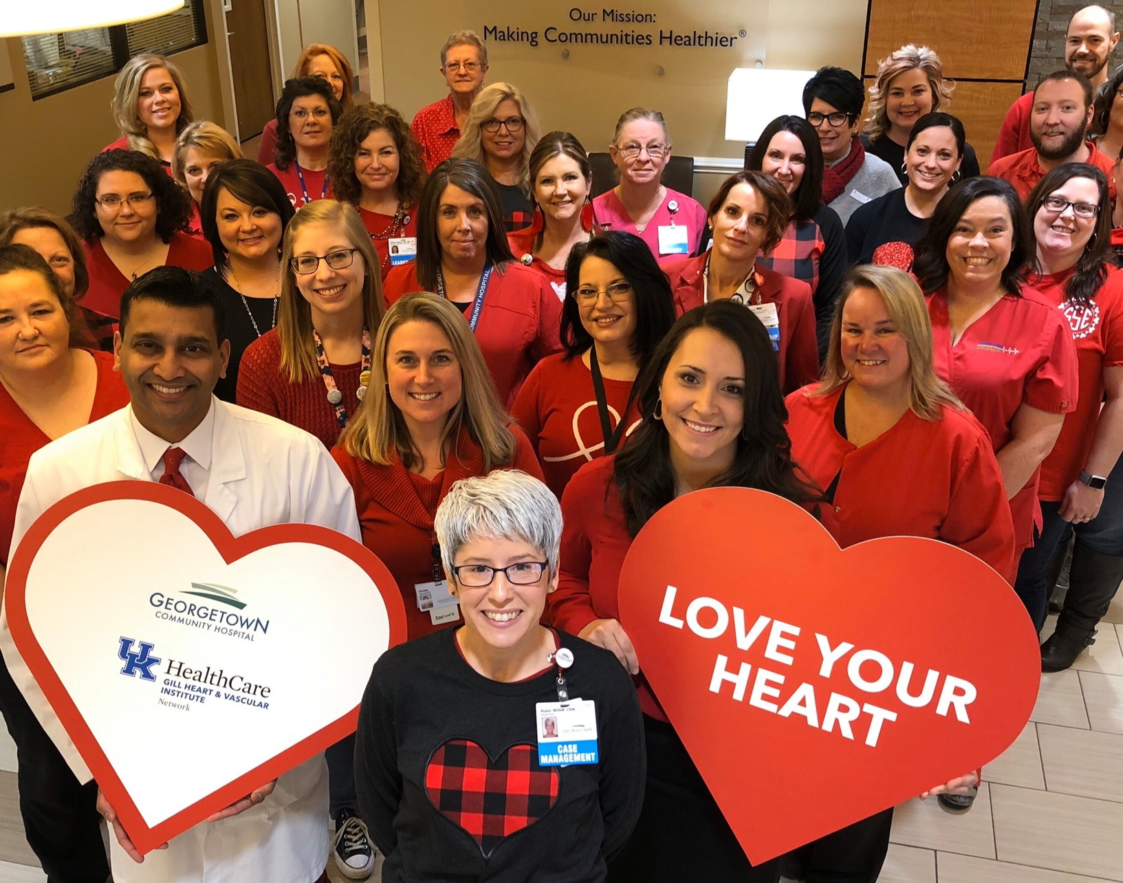 Employees of Georgetown Community Hospital gathered for a photo celebrating heart health.