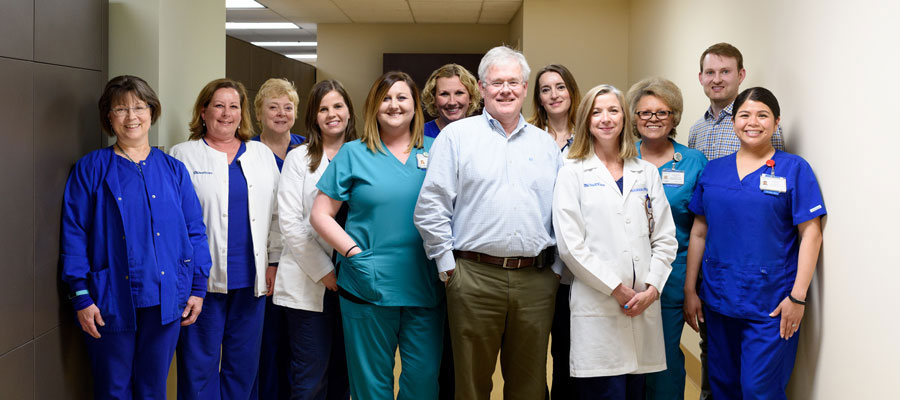 Dr. Tom McLarney with his colleagues.