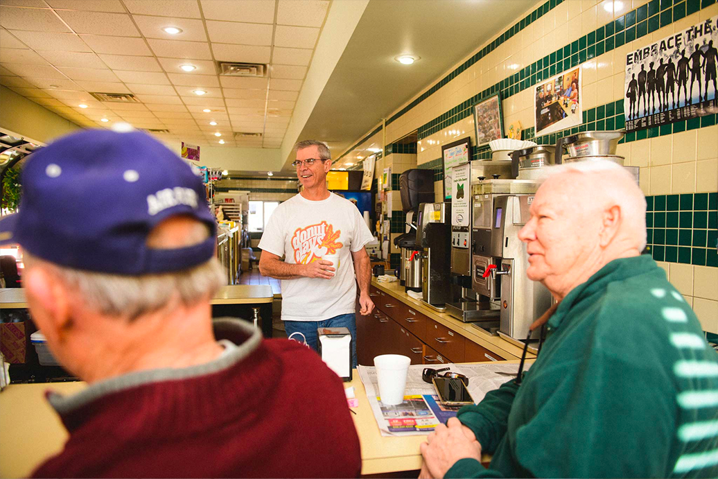 Fred Wohlstein waits on customers at his bakery.