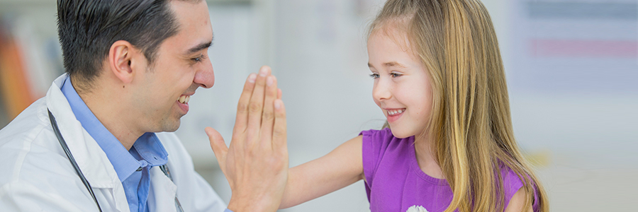 Girl giving a doctor a high-five