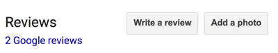 Screen capture of Google's "write a review" button