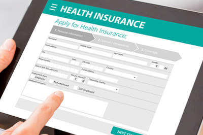 An insurance form is seen on a tablet.