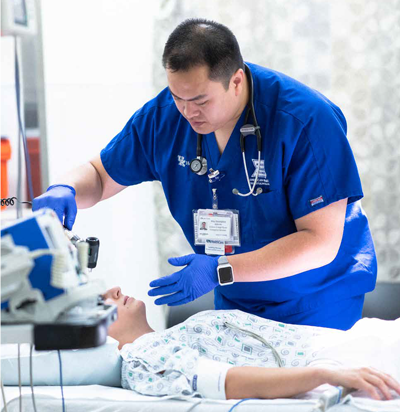 Khay Douangdara, RN, cares for a patient in the Chandler Emergency Department.