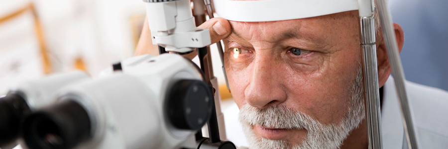 Man getting his eye's examined