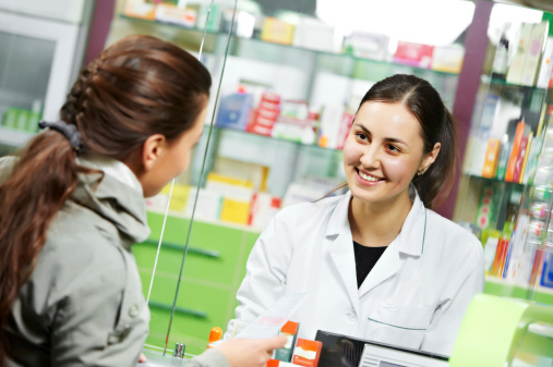 Pharmacist talking with patients