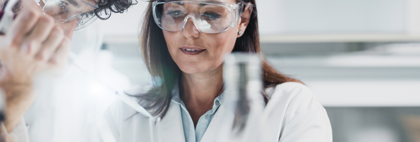 Stock photograph of two researchers working in a laboratory.
