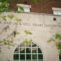 A relief carved into a building that reads Linda and Jack Gill Heart Institute