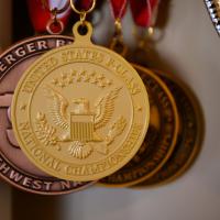A close-up of medals from Addison’s competitions, including the gold medal from the national championships.