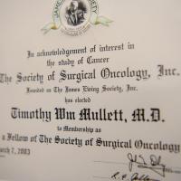Dr. Mullett's Oncology degree, framed and hanging on the wall.