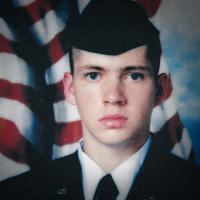18 year old Leonard's enlistment portrait.