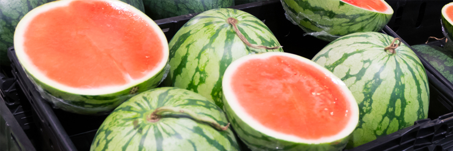 Whole and half watermelons